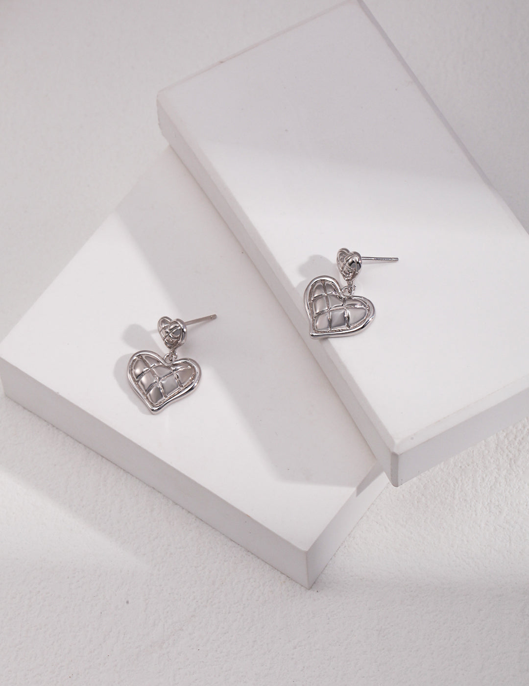 Heart Cushion Earring Drops in Silver color